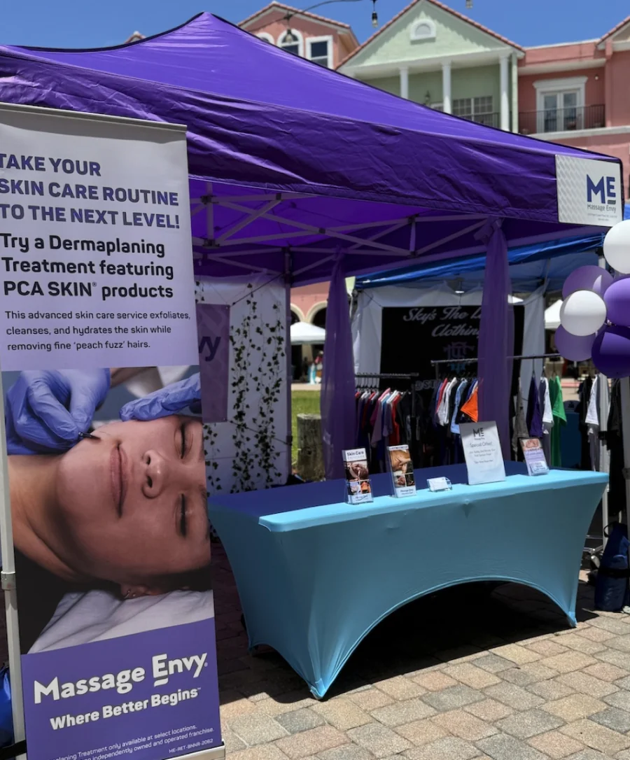 Massage Envy booth display at European Village